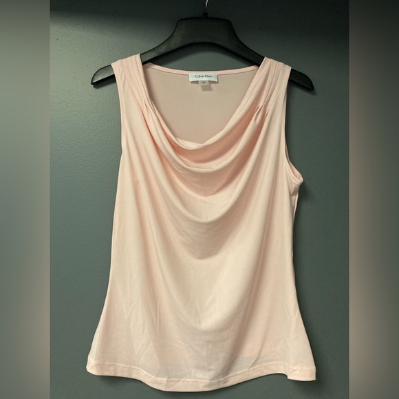 Calvin Klein Tops - Calvin Klein salmon colored tank. Poly spandex blend.
